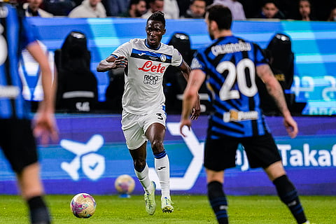 Italian Super Cup 2024-25: Atalanta's Odilon Kossounou runs with the ball 
