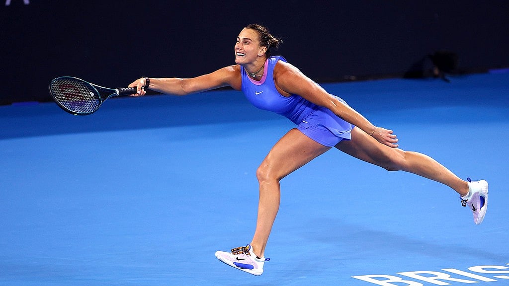 AP/Pat Hoelscher : Aryna Sabalenka plays a forehand during her match against Czech Republic's Marie Bouzkova at the Brisbane International in Brisbane.