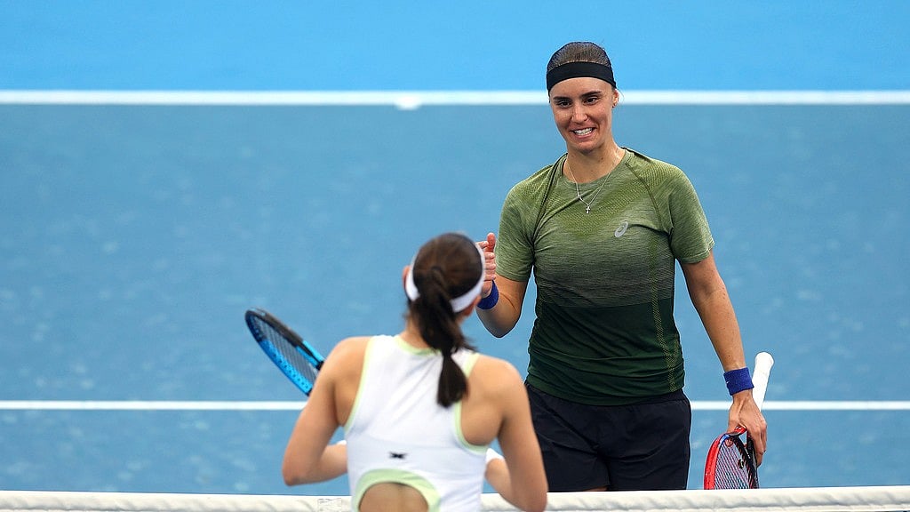 AP/Pat Hoelscher : Ukraine's Anhelina Kalinina reacts after winning against Australia's Kimberly Birrell at the Brisbane International in Brisbane, Australia.