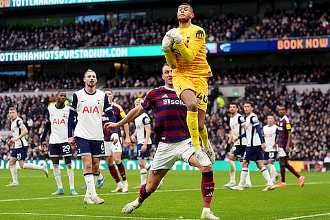 EPL 2024-25: Tottenham Hotspur goalkeeper Brandon Austin catches the ball 
