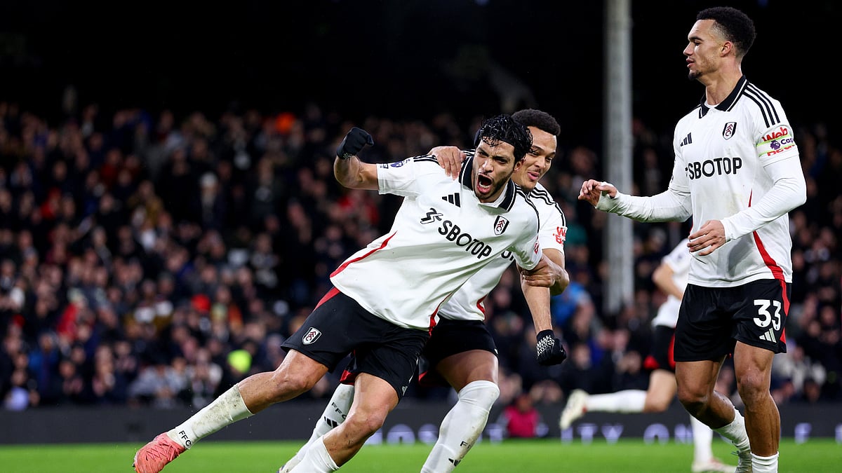 Raul Jimenez celebrates after scoring his second penalty