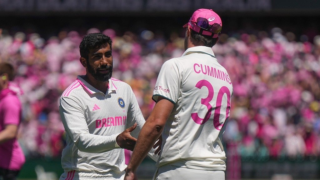 AP/Mark Baker : India's Jasprit Bumrah, left, shakes hands with Australia's captain Pat Cummins following the fifth cricket test between India and Australia at the Sydney Cricket Ground, in Sydney, Australia, Sunday, Jan. 5, 2025.