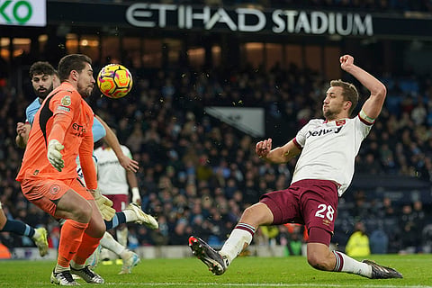 EPL 2024-25: West Ham's Tomas Soucek and Manchester City's goalkeeper Stefan Ortega battle for the ball
