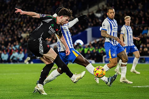 EPL 2024-25: Declan Rice is tackled by Brighton's Carlos Baleba 