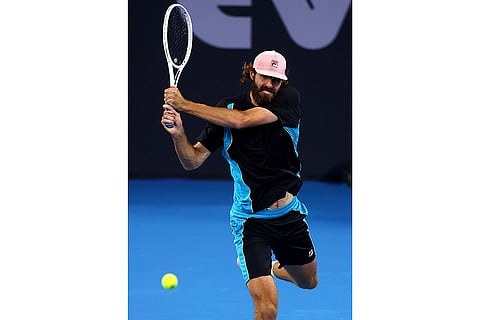 Brisbane International Tennis: Reilly Opelka plays a backhand against Jiri Lehecka