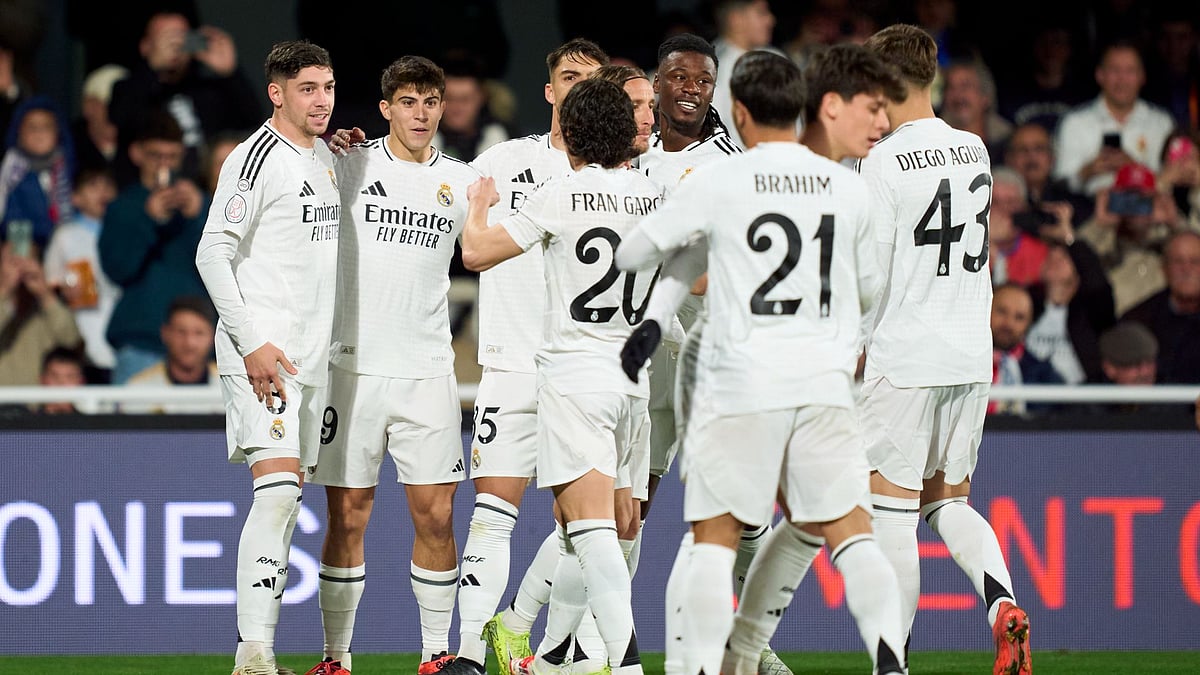 Madrid celebrate scoring against Minera