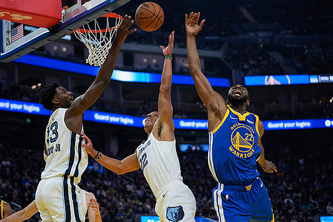 NBA 2024-25: Grizzlies forward Jaren Jackson Jr. (13), guard Desmond Bane and Warriors forward Andrew Wiggins compete for possession of the ball 