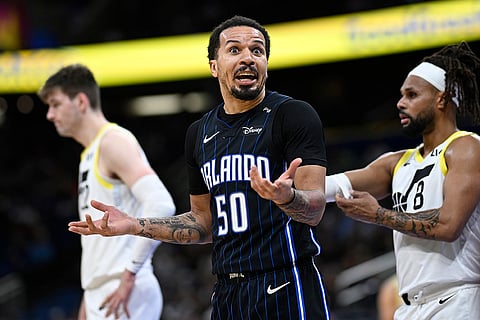 NBA 2024-25: Magic guard Cole Anthony (50) argues with an official