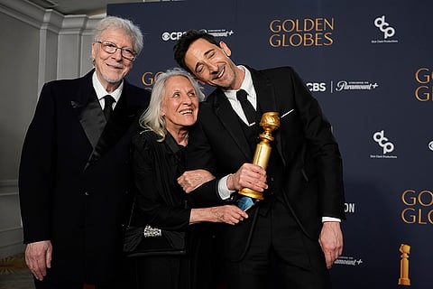 Elliot Brody, Sylvia Plachy, and Adrien Brody