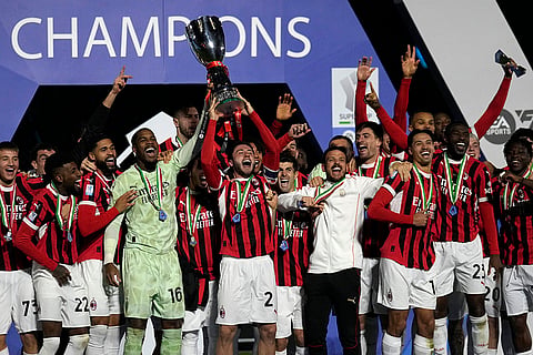 Italian Super Cup Final: AC Milan's team celebrates with the trophy