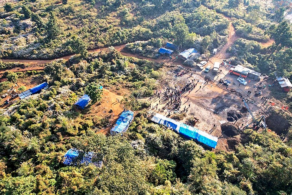 Rescue operation underway Labourers trapped inside a coal mine in Assam photo: 10