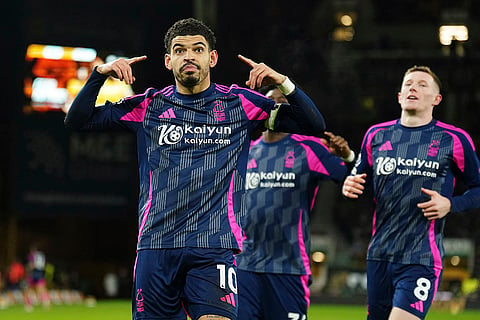 EPL 2024-25: Nottingham Forest's Morgan Gibbs-White, left, celebrates scoring their side's first goal 