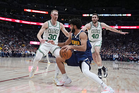 NBA 2024-25: Nuggets guard Jamal Murray, front drives to the basket