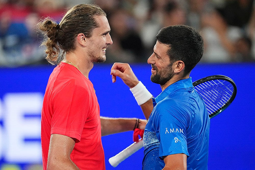 | Photo: AP/Vincent Thian : Australian Open 2025: Novak Djokovic, right, is congratulated by Alexander Zverev
