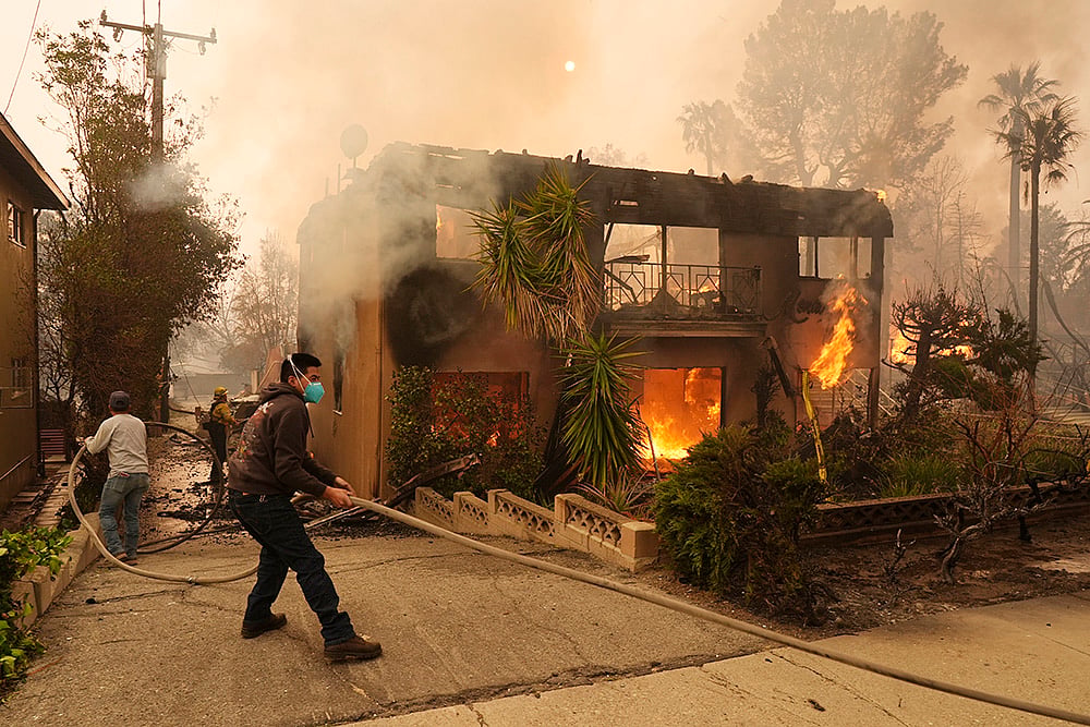 | Photo: AP/Chris Pizzello : Anthony Hopkins, Paris Hilton, Billy Crystal, and Adam Brody have lost their homes in the devastating LA wildfires. 