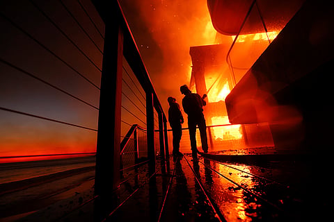 Palisades Fire burns a beach front property