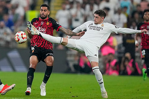 Spanish Super Cup: Real Madrid's Federico Valverde, right, is challenged by Mallorca's Omar Mascarell 
