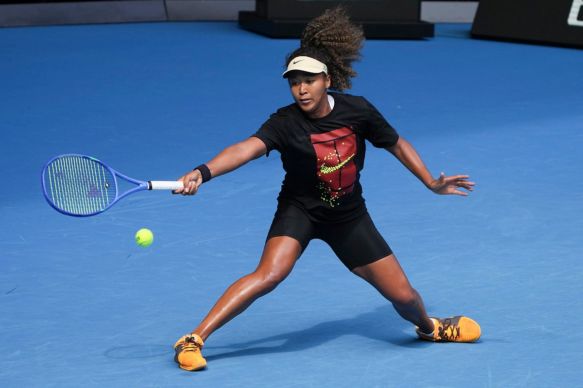 (AP Photo/Mark Baker) : Japan's Naomi Osaka plays a forehand return during a practice session ahead of the Australian Open tennis championship in Melbourne, Australia, Thursday, Jan. 9, 2025. 