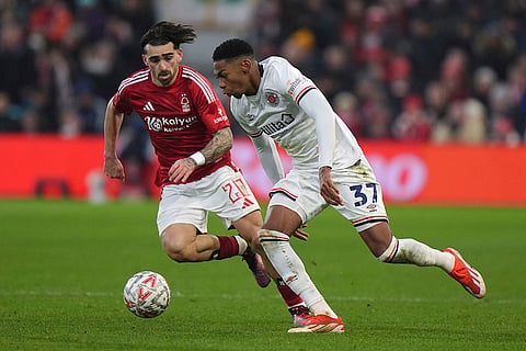 FA Cup Third Round: Luton Town's Zack Nelson and Nottingham Forest's Jota Silva battle for the ball 