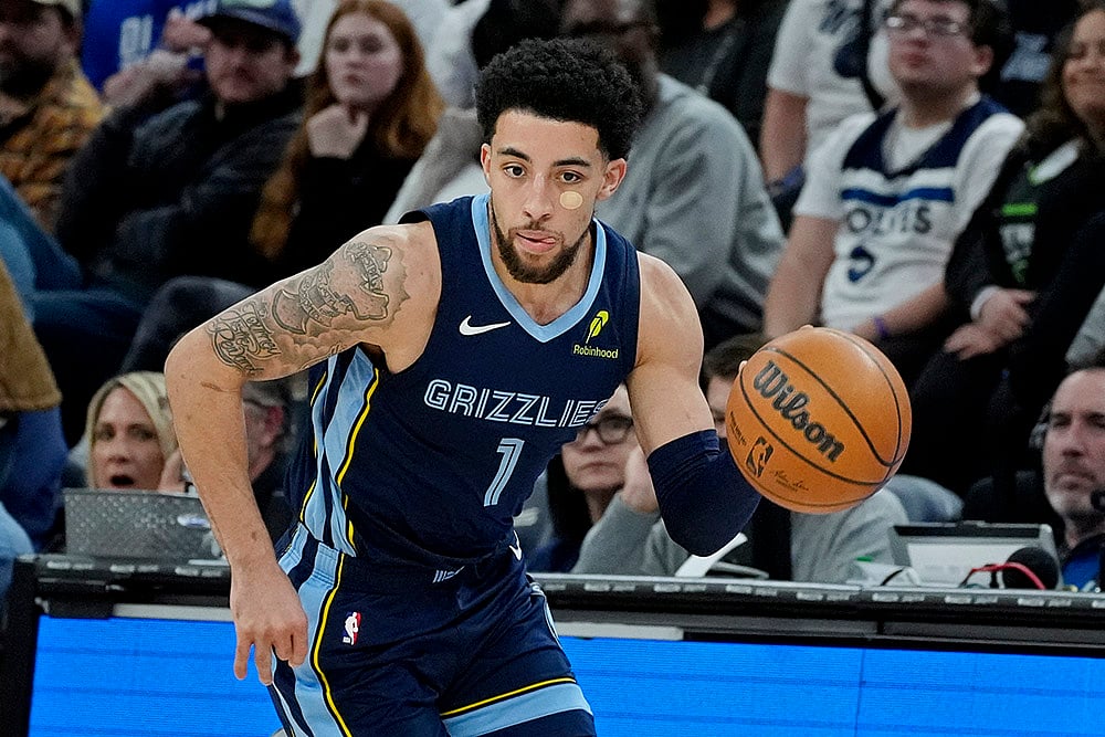 | Photo: AP/Bruce Kluckhohn : NBA 2024-25: Grizzlies guard Scotty Pippen Jr. steals the ball from the Timberwolves 