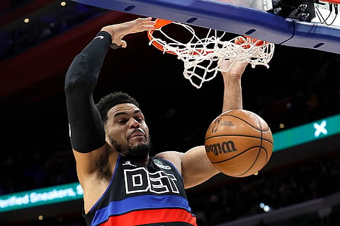 NBA 2024-25: Pistons forward Tobias Harris (12) dunks against the Raptors 