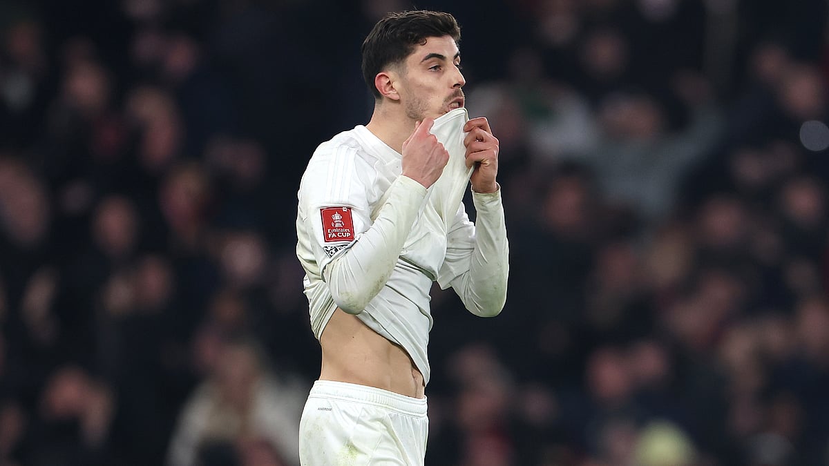 Kai Havertz reacts to seeing his penalty saved - null
