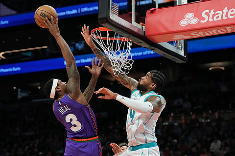 NBA 2024-25: Suns guard Bradley Beal (3) goes up to shoot 