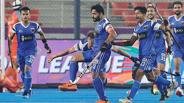 Hockey India : Harmanpreet Singh celebrates with teammates after scoring for Soorma Hockey Club against Delhi SG Pipers in Hockey India League.