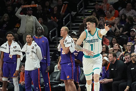 NBA 2024-25: Hornets guard LaMelo Ball (1) celebrates after his 3-point basket 
