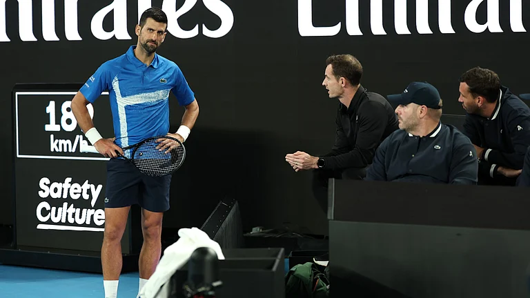 Novak Djokovic and coach Andy Murray - null
