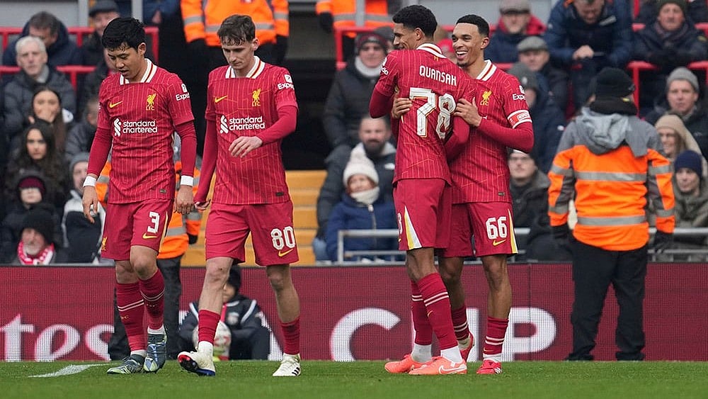 FA Cup Third Round: Liverpool's Trent Alexander-Arnold celebrates after scoring his side's second goal - | Photo: AP/Jon Super