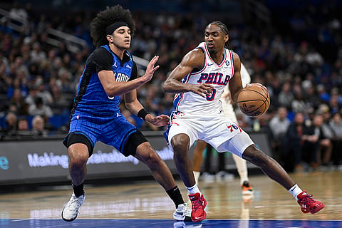 NBA 2024-25: 76ers guard Tyrese Maxey (0) drives to the basket 