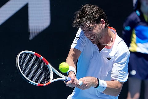 Australian Open 2025: Cameron Norrie plays a backhand return to Matteo Berrettini