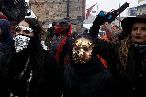 Masked revelers take part in Vevcani carnival 