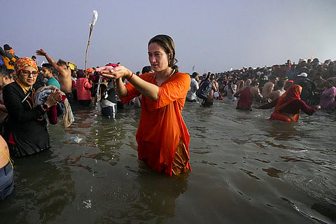 Makar Sankranti: A devotee performs rituals