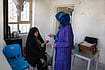 Who Will Deliver Afghan Women From Pain Shared by MSF : Najiba, an MSF midwife, seeing a patient in the MSF-supported Band-e-Amir community health facility in Bamyan, Afghanistan