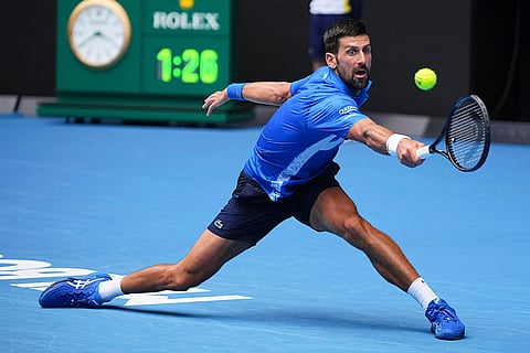 Australian Open 2025: Novak Djokovic plays a backhand return to Jaime Faria 