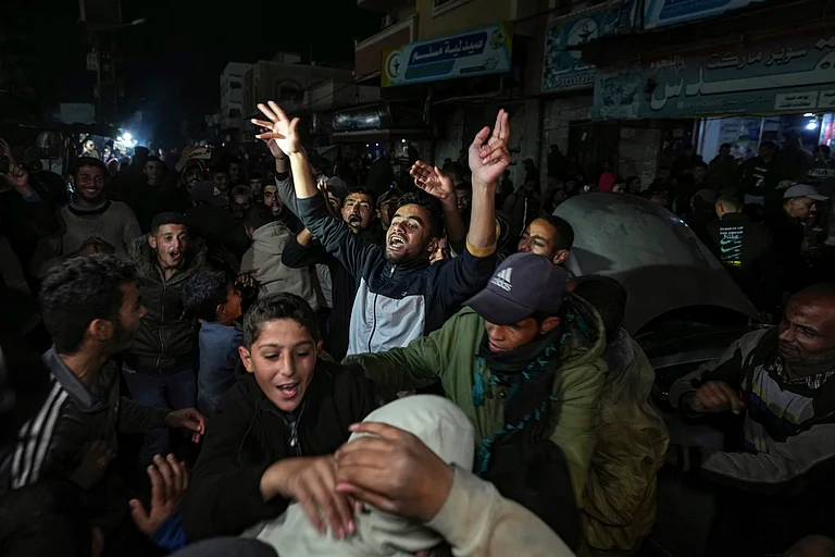 Gazans celebrate after learning a ceasefire deal has been agreed to - | Photo: AP