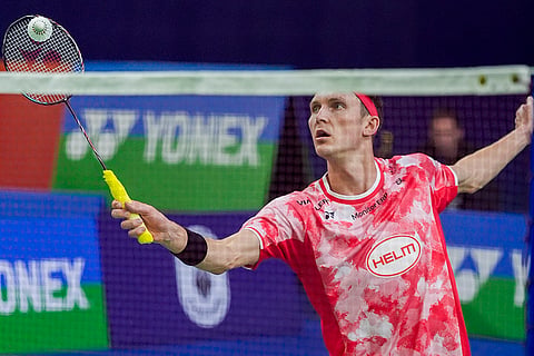 BWF India Open 2025: Denmark's Viktor Axelsen returns a shot  against Taiwan’s Chi Yu-jen