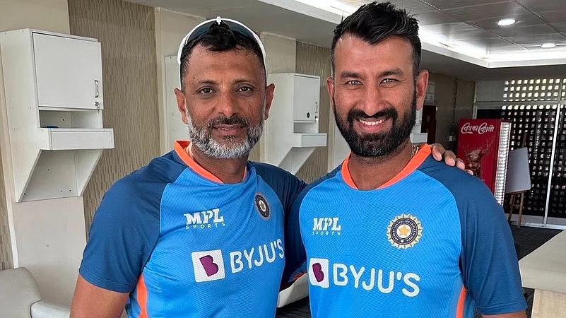 Sitanshu Kotak (left) with Cheteshwar Pujara.