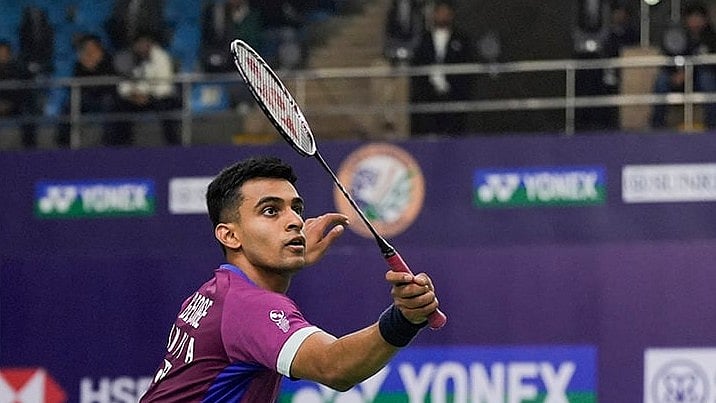 | Photo: PTI/Gurinder Osan : BWF India Open 2025: India's Kiran George returns to France's Alex Lanier 