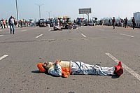 | Photo: Mayank Makhija : Desperate Measures: A protesting farmer lies down on the highway as part of a demonstration