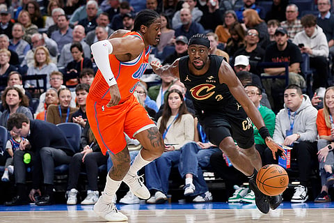 NBA 2024-25: Cavaliers guard Caris LeVert drives against Thunder forward Jalen Williams
