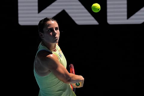 Australian Open 2025: Emma Navarro plays a backhand return to Ons Jabeur of Tunisia