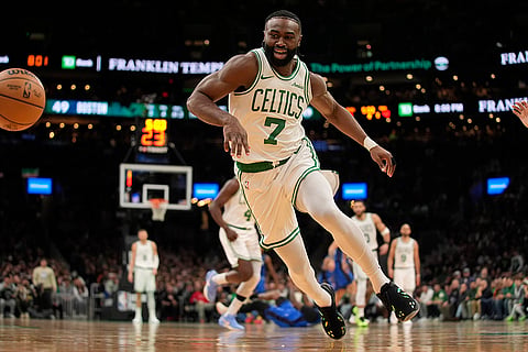 NBA 2024-25: Celtics' Jaylen Brown (7) chases a loose ball