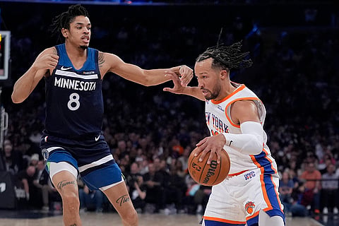 NBA 2024-25: Knicks' Jalen Brunson (11) drives past Minnesota Timberwolves' Josh Minott