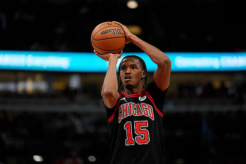 NBA 2024-25: Bulls forward Julian Phillips takes a free throw