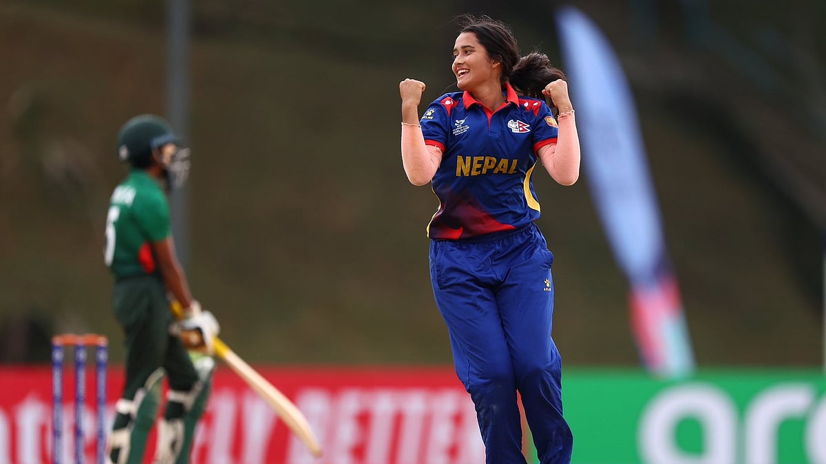 X/ @CricketNep : Nepal player celebrating a wicket.