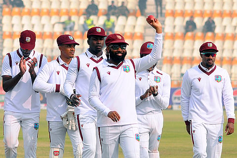 PAK vs WI 1st Test Day 3:  West Indies Jomel Warrican raises the ball to acknowledge the crowd 