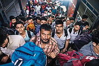 Outsider-Insider: The Delhi Migrant's Precarious Position | Photo: Vikram Sharma : Riding on Hope: Migrant labourers from Bihar arriving at New Delhi station via the Sampark Kranti Express